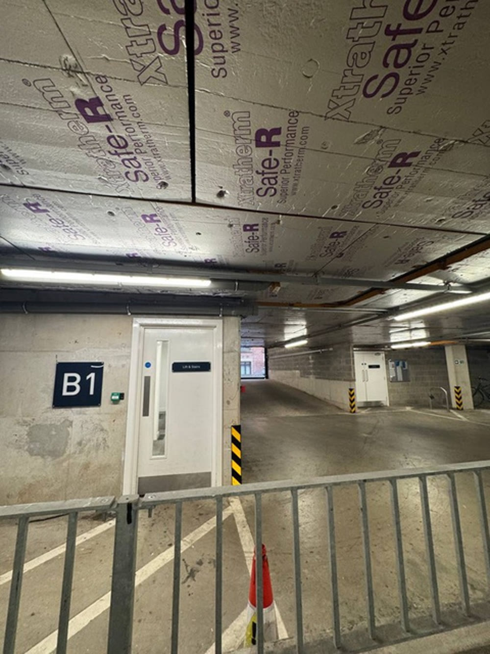 Level B1 with the rubbish area near the garage exit.
